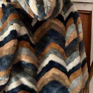 Before you…fake fur coat!